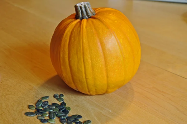 Pumpkin with pumpkin seed — Stock Photo, Image