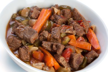 Beeef stew with carrots, mushrooms, courgettes clipart