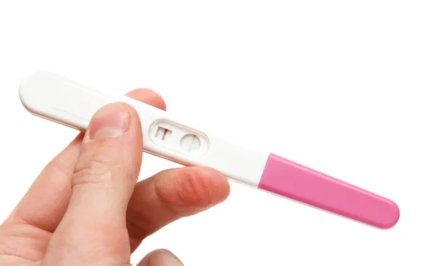 Teste de gravidez na mão — Fotografia de Stock