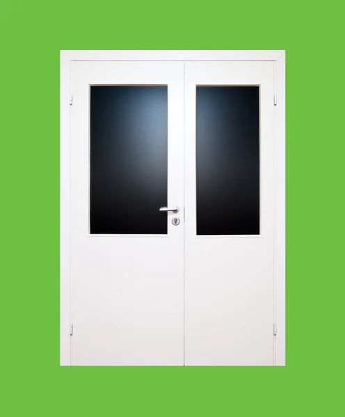Białe drzwi na zieloną — Zdjęcie stockowe