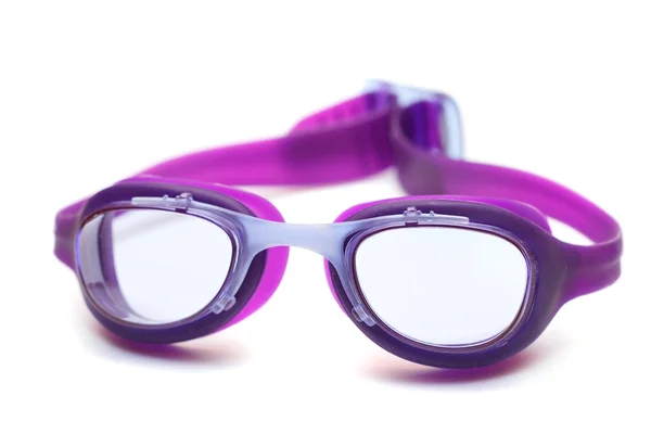 Gafas violetas para nadar sobre fondo blanco —  Fotos de Stock
