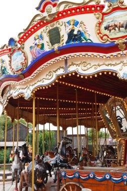 Carousel with horses clipart