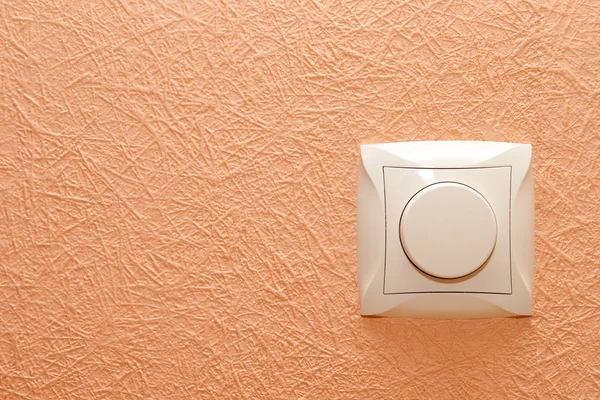 Botão-interruptor em uma parede — Fotografia de Stock