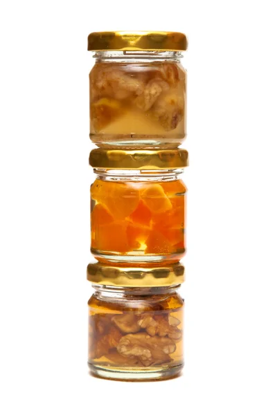 Honung med nötter i en pyramid — Stockfoto