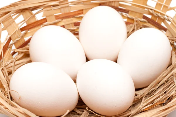 White eggs in a basket — Stock Photo, Image