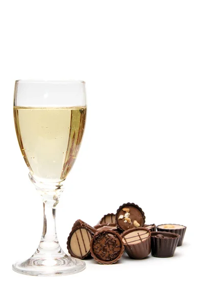 Kieliszek szampana i czekolada — Zdjęcie stockowe