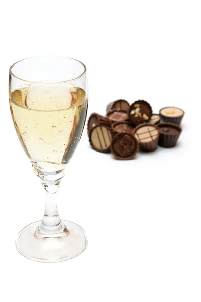 Glas champagne en chocolade — Stockfoto