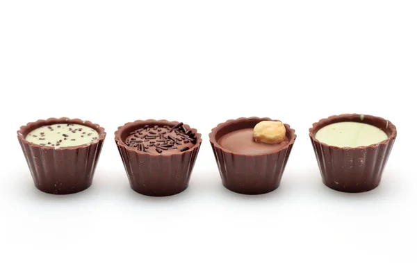 Chocolates mezclados en fila —  Fotos de Stock