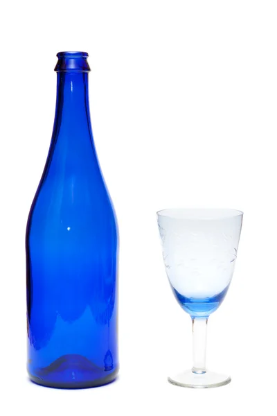 Blå flaska med glas — Stockfoto