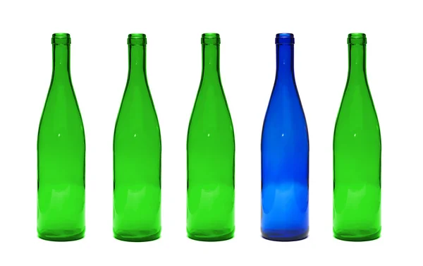 Зеленый и синий стеклянные бутылки — стоковое фото