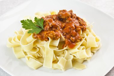 Pappardelle pasta with meat sauce clipart