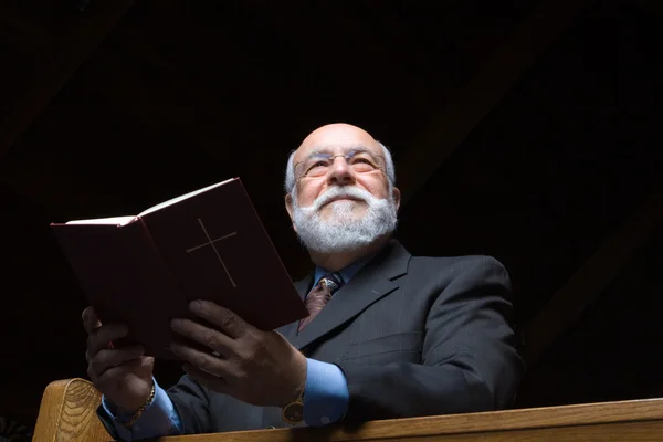 Hansom Senior Caucasian Man Holding a Hymnal in Church Pew — Stock Photo, Image
