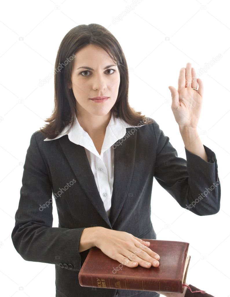 Caucasian Woman Swearing on a Bible Isolated White Background