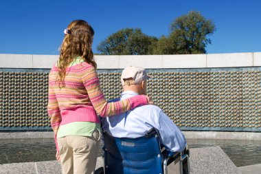 Grandfather Granddaughter Wheelchair WWII Memorial clipart