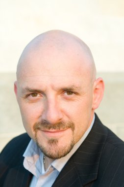 Head Shot 30's Bald Guy Goatee Looking at Camera clipart