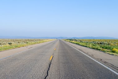 Middle of Empty Road Rural Taos New Mexico clipart