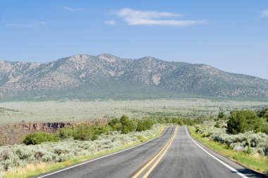 Road into Mountains Rio Grande Gorge Taos NM clipart