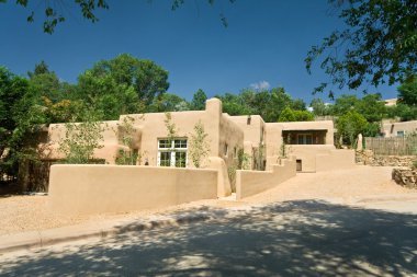 Exterior of a Modern Adobe Santa Fe, New Mexico Home clipart