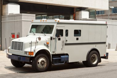 Armoured Armored Car Parked on Street Building clipart