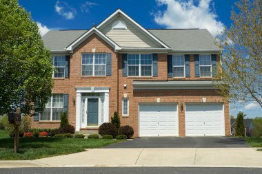 Front View Brick Single Family Home Suburban MD clipart