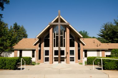 Outside of a Modern Church Big Cross clipart