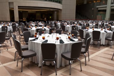 Large Room Set Up for a Banquet, Round Tables clipart