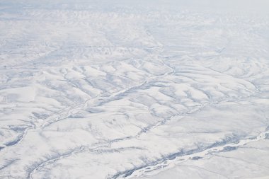 Snow Covered Verkhoyansk Mountains Olenyok River clipart