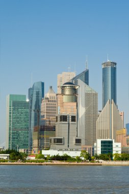 Skyscrapers in Pudong Section Shanghai, China Huangpu River Fore clipart