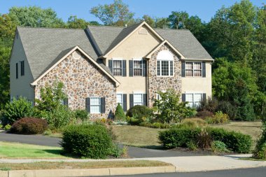 New Stone Faced Single Family Home Suburban Philadelphia, Pennsy clipart