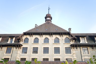 Imposing Old Gothic School in Geneva Switzerland Wide Angle Lens clipart