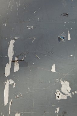 XXXL Gray Paint and Poster Paper Scraps Peeling Off Wall clipart