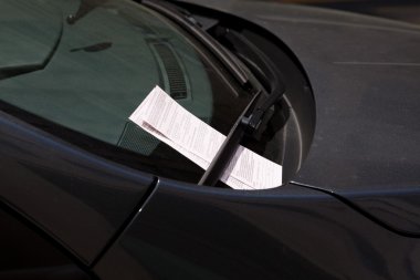 Two Parking Tickets on Car Windshield, Washington DC, USA clipart