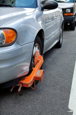 XL Car Boot on Tire, Failed to Pay Parking Ticket clipart