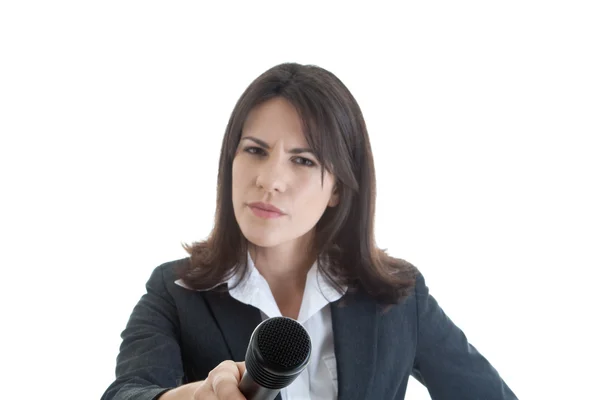 Escéptica mujer caucásica sosteniendo micrófono fondo blanco — Foto de Stock