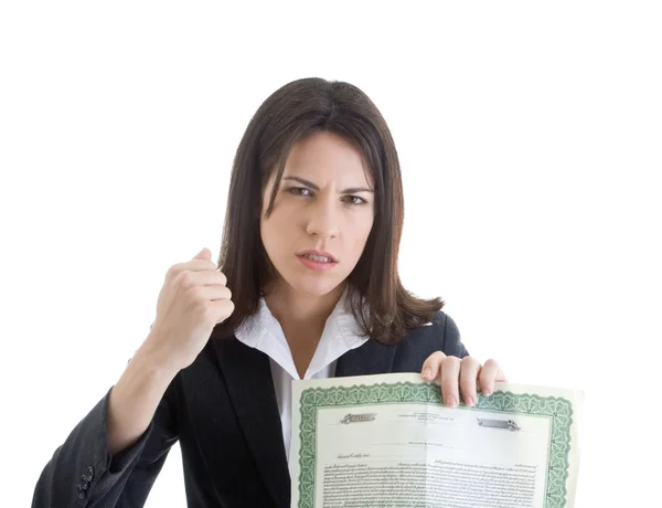 Irritada mulher branca segurando certificado de estoque e acenando punho — Fotografia de Stock