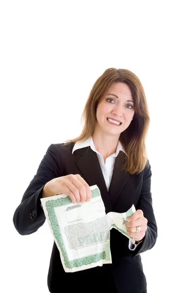 Mujer preocupada rasgando certificado de stock, aislado — Foto de Stock