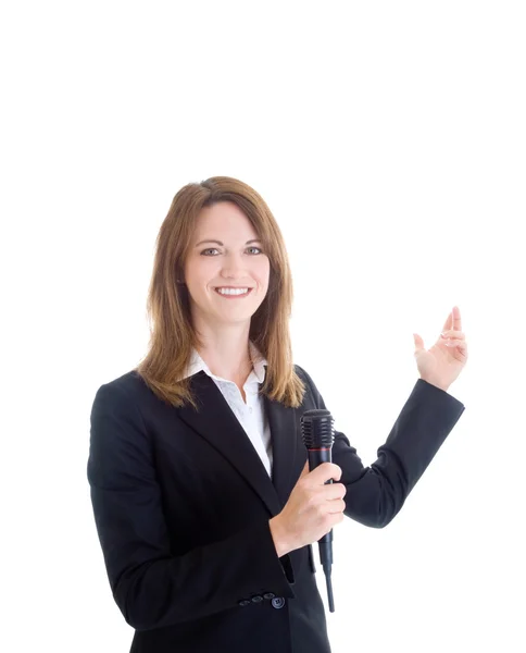 Lachende Kaukasische vrouw met draadloze microfoon gebaren wh — Stockfoto