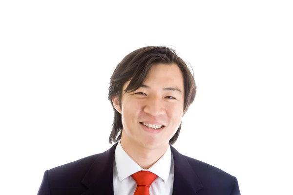 Felice asiatico uomo d'affari in un vestito su sfondo bianco — Foto Stock