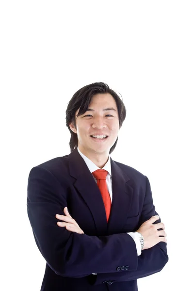 Uśmiechający się pewnie azjatycki biznesmen na białym tle — Zdjęcie stockowe