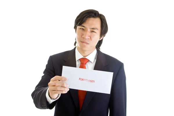 Angry Aziatische man pak houden verhindering aankondiging witte achtergrond — Stockfoto