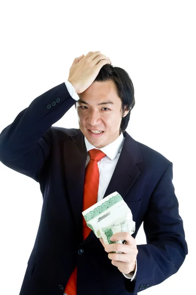 Enojado asiático hombre sosteniendo arrugado stock certificado mano en cabeza — Foto de Stock