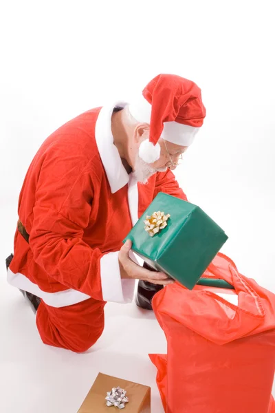 Santa Looking Sack Holding Present Gift Isolated — Stock Photo, Image