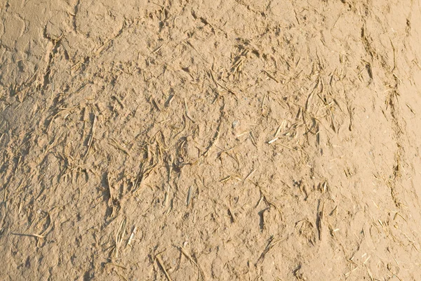 Mur de boue Adobe plein cadre, texture de paille rugueuse — Photo