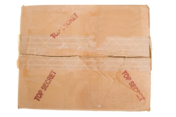 Grungy παλιά χαρτόνι κουτί ΑΚΡΩΣ ΑΠΟΡΡΗΤΟ που ξεφλούδισμα ταινία — Φωτογραφία Αρχείου