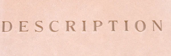 Word "Discription" Carved in Sandstone Stone — Stock Photo, Image