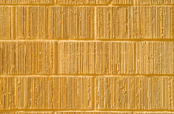 Pełna rama żółty rowkowane mur z cegły — Zdjęcie stockowe