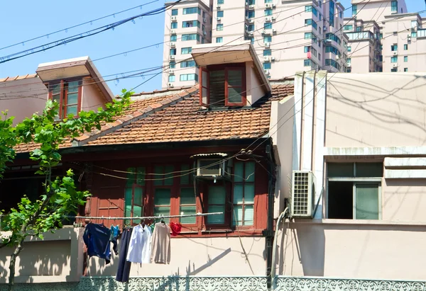 stock image Old Home Laundry and Wires Contrast New Apartment Homes Shanghai