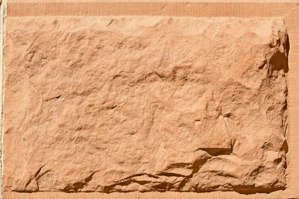 Blok rustykalne szorstki wyciąć czerwonego piaskowca kamień powierzchni — Zdjęcie stockowe