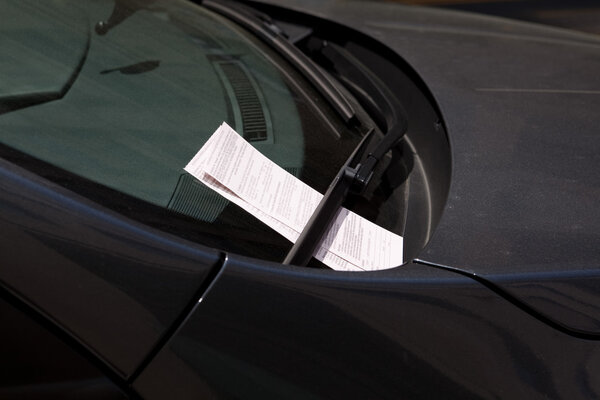 Two Parking Tickets on Car Windshield, Washington DC, USA