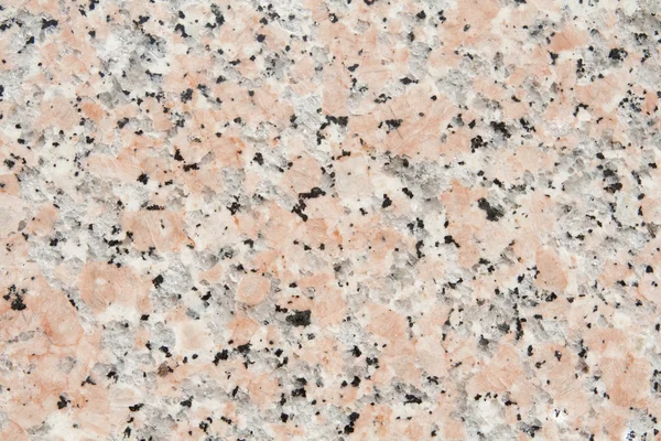 Full-frame polírozott rózsaszín gránit kő felülete — Stock Fotó